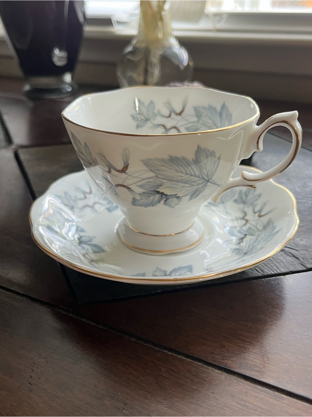 Elegant Royal Albert Bone China Teacup & Saucer Set in Pale Blue with Gold Trim